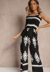 Renee - Czarny Kombinezon Wide Leg z Wiskozy na Ramiączkach Zdobiony Etnicznym Wzorem Melriti. Okazja: na co dzień. Kolor: czarny. Materiał: wiskoza. Długość rękawa: na ramiączkach. Wzór: aplikacja. Styl: klasyczny, casual