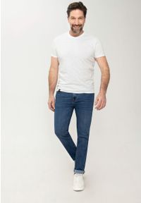 Volcano - Granatowe jeansy męskie z prostą nogawką, recyklowany poliester Repreve, D‑LEON 46. Kolekcja: plus size. Kolor: niebieski. Styl: klasyczny #1