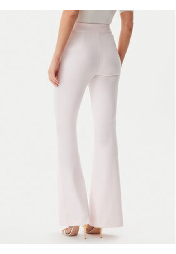 Guess Spodnie materiałowe W4YB01KCBO2 Różowy Flare Fit. Kolor: różowy. Materiał: syntetyk