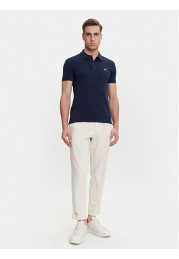 Lacoste Polo PH4012 Granatowy Slim Fit. Typ kołnierza: polo. Kolor: niebieski. Materiał: bawełna