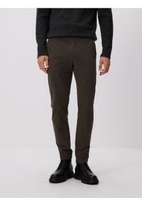 Reserved - Spodnie chino slim fit - zielony. Kolor: zielony. Materiał: tkanina, bawełna
