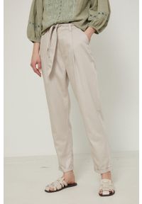 medicine - Medicine spodnie damskie kolor beżowy fason chinos high waist. Stan: podwyższony. Kolor: beżowy