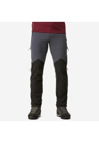 FORCLAZ - Spodnie trekkingowe męskie Forclaz MT900 wiatroodporne. Kolor: wielokolorowy, czarny, szary. Materiał: materiał, tkanina. Wzór: ze splotem