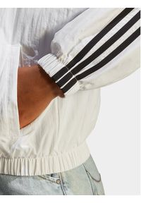 Adidas - adidas Wiatrówka Essentials 3-Stripes IC0560 Biały Loose Fit. Kolor: biały. Materiał: syntetyk #3
