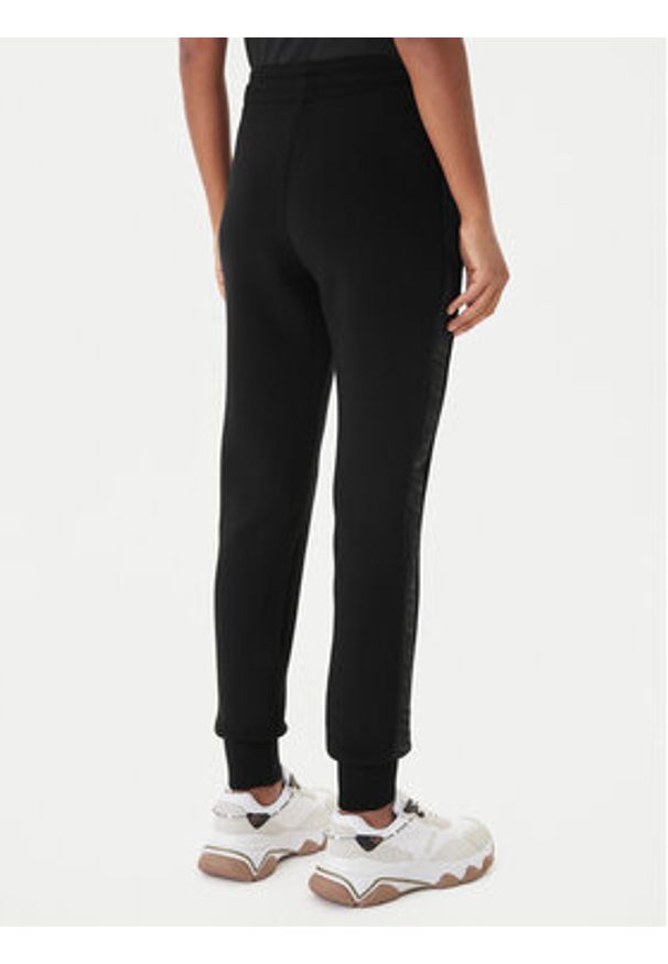 Guess Spodnie dresowe V2YB18 K7UW2 Czarny Regular Fit. Kolor: czarny. Materiał: wiskoza