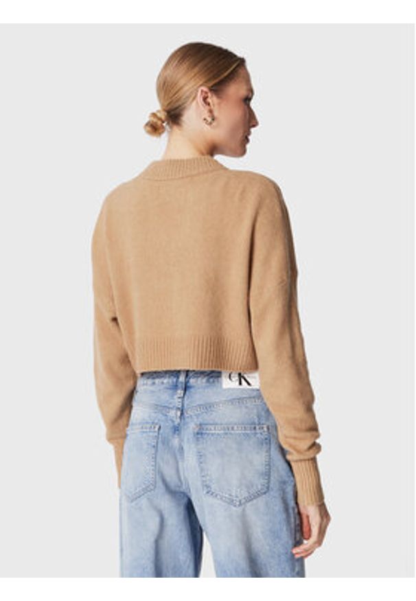 Calvin Klein Jeans Sweter J20J220525 Beżowy Relaxed Fit. Kolor: beżowy. Materiał: syntetyk