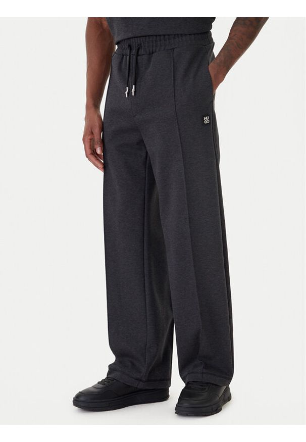 Hugo - HUGO Spodnie dresowe Dineto 50553432 Szary Relaxed Fit. Kolor: szary. Materiał: bawełna
