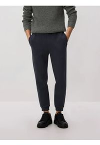 Reserved - Spodnie dresowe slim fit - ciemnoszary. Kolor: szary. Materiał: dresówka