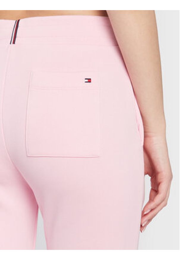 TOMMY HILFIGER - Tommy Hilfiger Spodnie dresowe Monogram Emb WW0WW37435 Różowy Regular Fit. Kolor: różowy. Materiał: bawełna, syntetyk