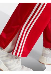 Adidas - adidas Spodnie dresowe adicolor Classics Firebird IJ7057 Czerwony Regular Fit. Kolor: czerwony. Materiał: syntetyk #3