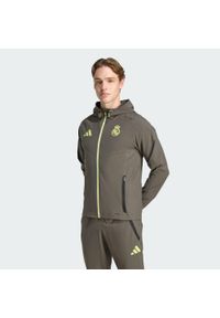 Adidas - Kurtka Real Madrid Tiro 25 Competition Vis Tech Travel Jacket. Kolor: szary, wielokolorowy, żółty. Materiał: dresówka. Sport: piłka nożna