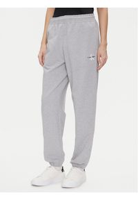 Calvin Klein Jeans Spodnie dresowe Monologo LV047B235G Szary Regular Fit. Kolor: szary. Materiał: bawełna