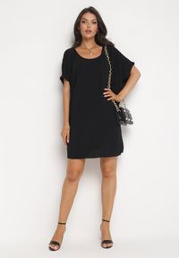 Born2be - Czarna Mini Sukienka z Krótkim Rękawem o Fasonie Nietoperza Kharson. Kolor: czarny. Długość rękawa: krótki rękaw. Styl: boho. Długość: mini