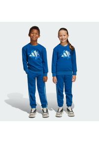 Adidas - Zestaw adidas Disney Lilo & Stitch Jogger Kids. Kolor: niebieski. Materiał: bawełna, dresówka. Wzór: motyw z bajki