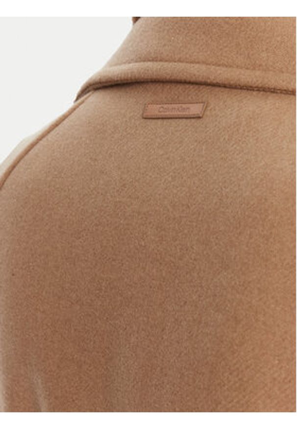 Calvin Klein Płaszcz wełniany LV044D557G Beżowy Regular Fit. Kolor: beżowy. Materiał: wełna