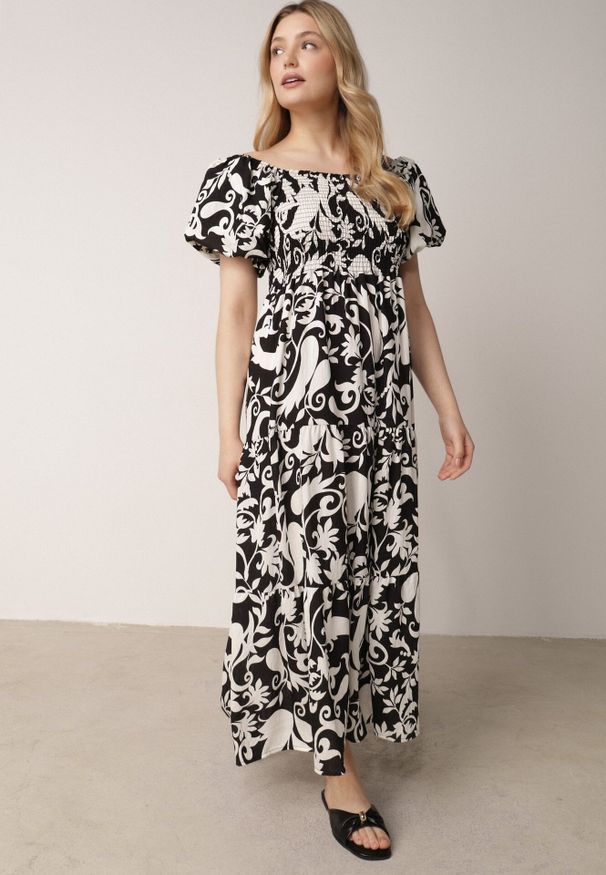 Born2be - Czarna Rozkloszowana Sukienka z Wiskozy z Bufiastymi Rękawami w Roślinny Wzór Semea. Okazja: do pracy, na co dzień, na spotkanie biznesowe. Kolor: czarny. Materiał: wiskoza. Sezon: lato. Typ sukienki: proste, rozkloszowane. Styl: biznesowy, casual. Długość: maxi