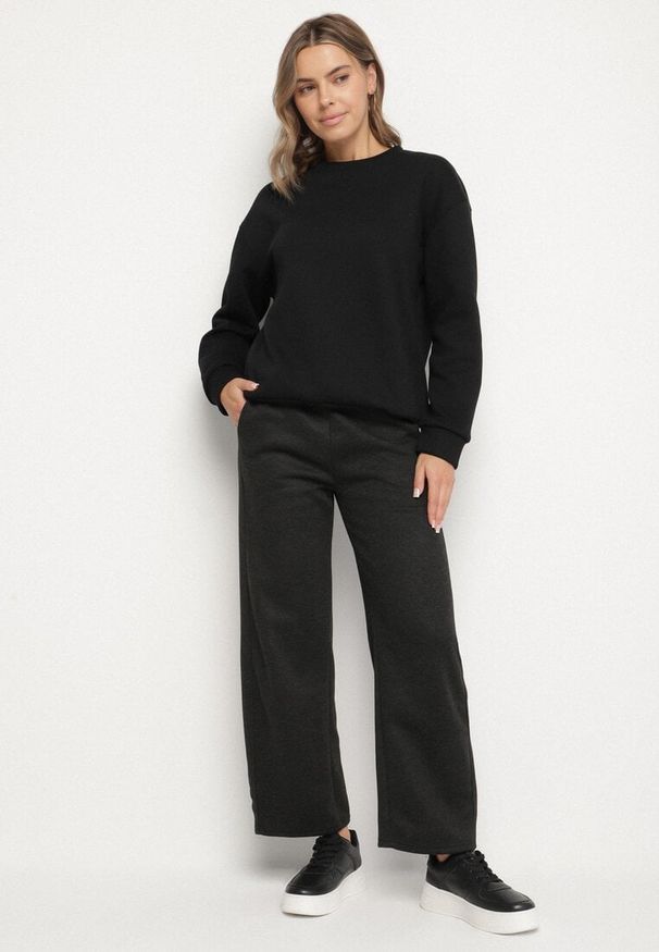 Born2be - Czarne Bawełniane Ocieplane Spodnie o Szerokim Kroju z Wysokim Stanem Hinatila. Stan: podwyższony. Kolor: czarny. Materiał: bawełna. Styl: elegancki