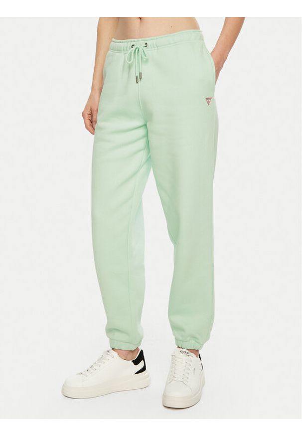Guess Jeans Spodnie dresowe W4YB33 KC811 Zielony Regular Fit. Kolor: zielony. Materiał: bawełna