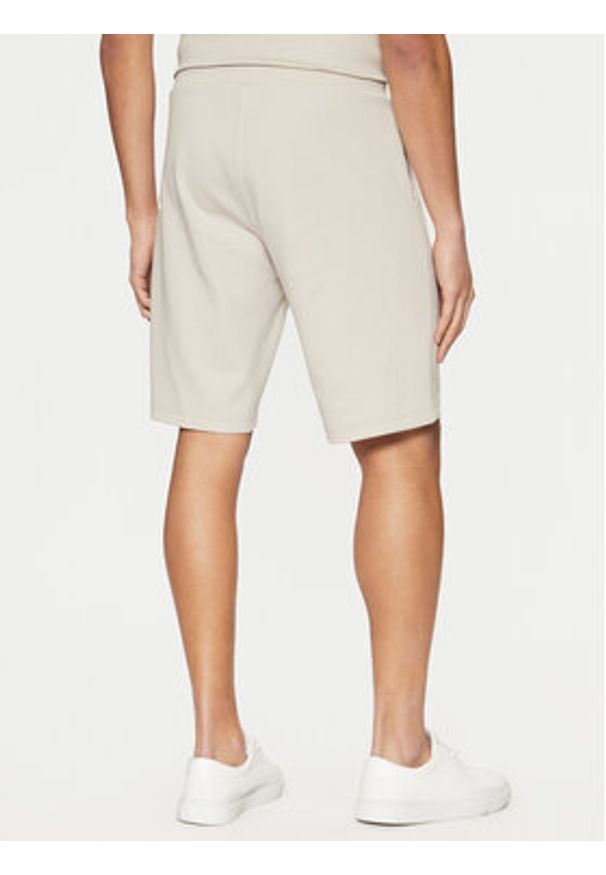 Calvin Klein Szorty sportowe Micro Logo K10K111208 Beżowy Regular Fit. Kolor: beżowy. Materiał: bawełna, syntetyk. Styl: sportowy