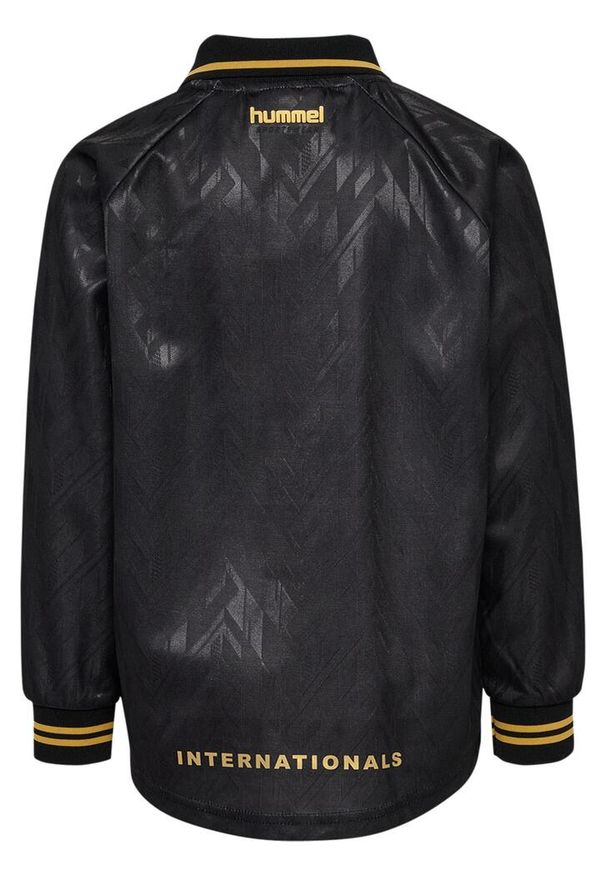 Dziecięcy dżersej z długim rękawem Hummel Bay Loose. Typ kołnierza: polo. Kolor: czarny. Materiał: jersey. Długość rękawa: długi rękaw. Długość: długie. Styl: młodzieżowy