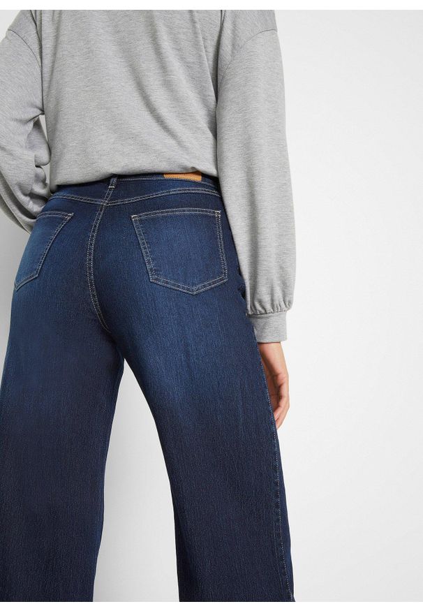 bonprix - Dżinsy Wide Leg Mid Waist, ze stretchem. Kolor: niebieski