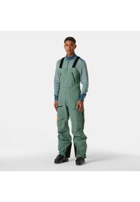 Spodnie narciarskie z szelkami Helly Hansen Ridge Infinity. Kolor: zielony. Sezon: zima. Sport: narciarstwo