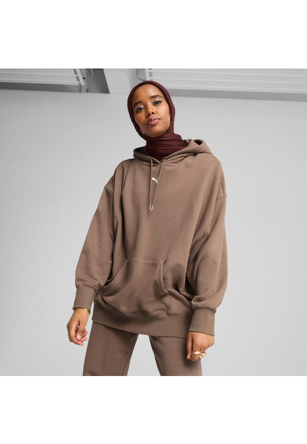 Damska bluza oversize z kapturem Puma Essentials TR. Typ kołnierza: kaptur. Kolor: brązowy