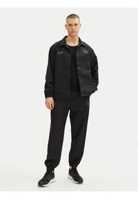 EA7 Emporio Armani Spodnie dresowe 7M000264 AF13722 UC001 Czarny Modern Fit. Kolor: czarny. Materiał: syntetyk