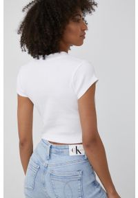 Calvin Klein Jeans t-shirt damski kolor biały. Kolor: biały. Materiał: lycra. Długość rękawa: krótki rękaw. Długość: krótkie. Wzór: aplikacja #3