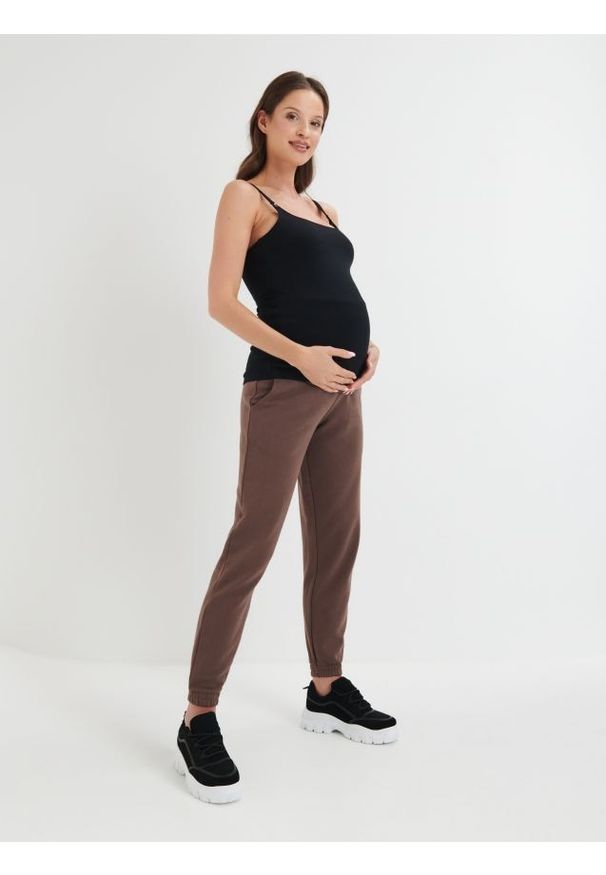 Sinsay - Spodnie dresowe MAMA - brązowy. Kolor: brązowy. Materiał: dresówka