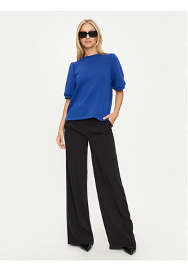 Vila Bluza Reflect 14097562 Niebieski Loose Fit. Kolor: niebieski. Materiał: syntetyk