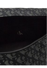 Calvin Klein Jeans Saszetka nerka Unstrctrd Mngrm Ovrs LV04G3098G Czarny. Kolor: czarny. Materiał: materiał #4