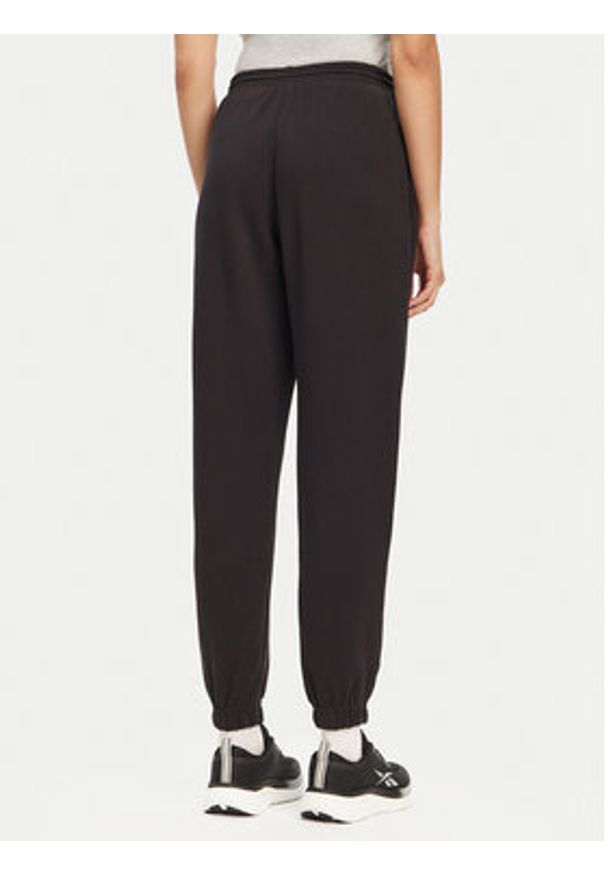 Reebok Spodnie dresowe 100071691 Czarny Regular Fit. Kolor: czarny. Materiał: bawełna