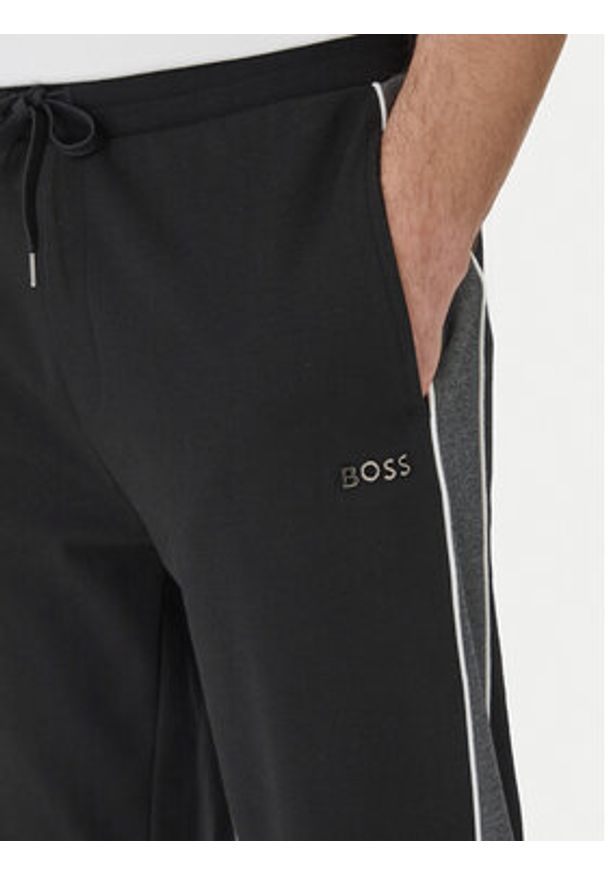 BOSS Spodnie dresowe 50554794 Czarny Regular Fit. Kolor: czarny. Materiał: bawełna