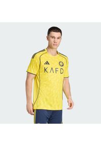Adidas - Koszulka podstawowa Al Nassr FC 25/26. Kolor: niebieski, wielokolorowy, żółty. Sport: piłka nożna