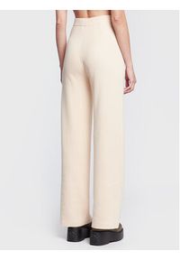 Calvin Klein Spodnie dzianinowe K20K204625 Beżowy Regular Fit. Kolor: beżowy. Materiał: dzianina, syntetyk, bawełna