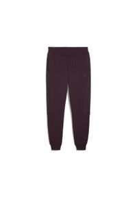 Puma Spodnie Ess+ Tape Fl Cl 84904245. Kolor: fioletowy. Materiał: dresówka