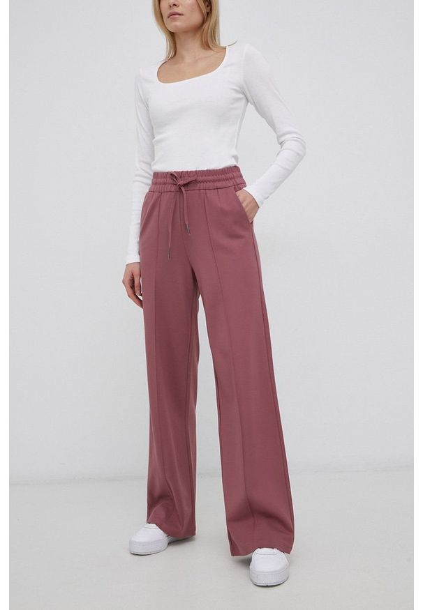 only - Only Spodnie damskie kolor różowy proste high waist. Okazja: na co dzień. Stan: podwyższony. Kolor: różowy. Materiał: tkanina, materiał, wiskoza. Styl: casual