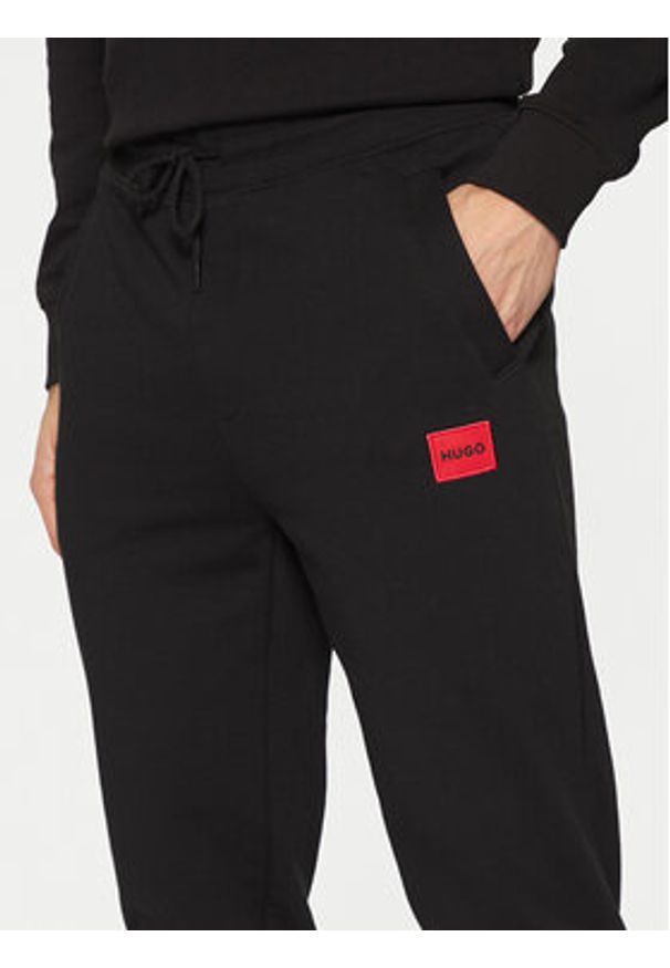 Hugo Spodnie dresowe Doak212 50447963 Czarny Regular Fit. Kolor: czarny. Materiał: bawełna