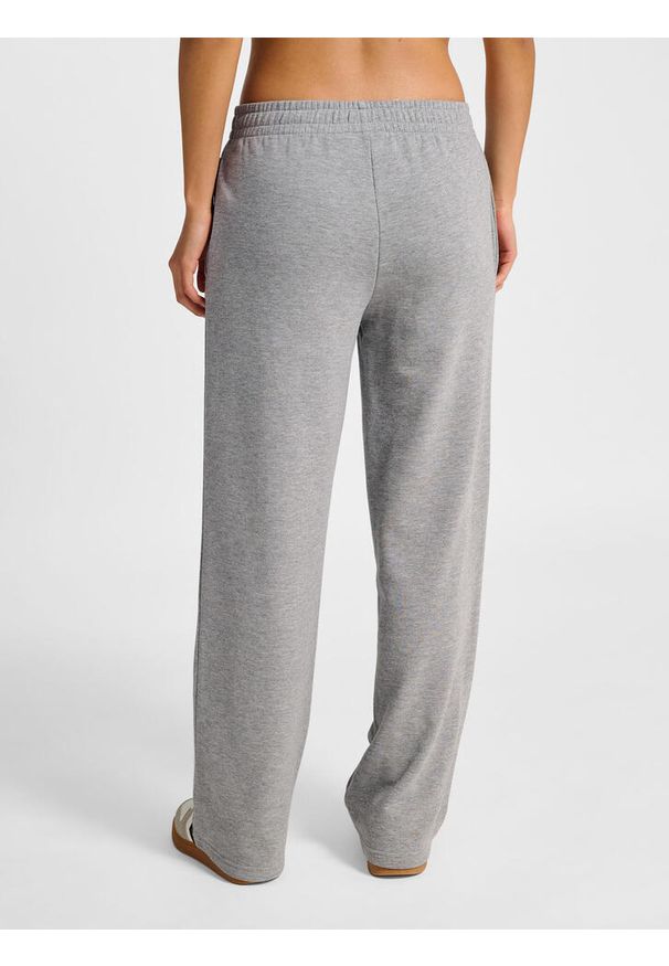 Spodnie dresowe szerokie nogawki damskie Hummel Pulse. Kolor: szary. Materiał: dresówka. Sport: fitness