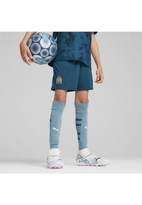 Puma - Młodzieżowe szorty Olympique Marsylia 24/25 PUMA Ocean Tropic Bold Blue. Kolor: niebieski. Sport: piłka nożna
