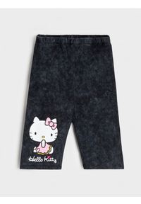 Sinsay - Krótkie legginsy Hello Kitty - czarny. Kolor: czarny. Długość: krótkie. Wzór: motyw z bajki