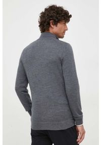 Calvin Klein sweter wełniany męski kolor szary lekki z golferm. Typ kołnierza: golf. Kolor: szary. Materiał: wełna #4