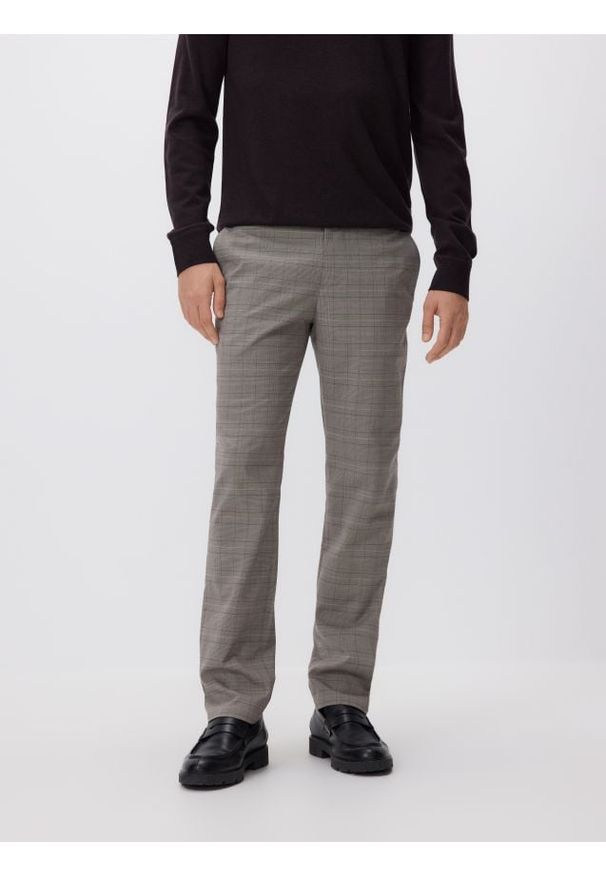 Reserved - Spodnie chino slim fit - beżowy. Kolor: beżowy. Materiał: wiskoza, tkanina