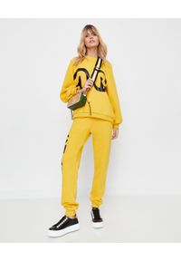 CHAOS BY MARTA BOLIGLOVA - Spodnie dresowe z logo Bree. Kolor: żółty. Materiał: dresówka. Wzór: nadruk