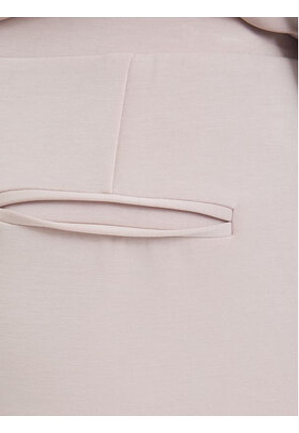 Guess Spodnie dresowe V4YB07 KCAY2 Różowy jasny Relaxed Fit. Kolor: różowy. Materiał: syntetyk