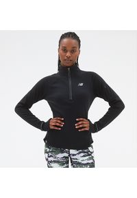 Bluza damska New Balance WT23252BK – czarna. Kolor: czarny. Materiał: dresówka, materiał, tkanina, poliester, skóra. Długość: długie. Sezon: zima. Sport: fitness