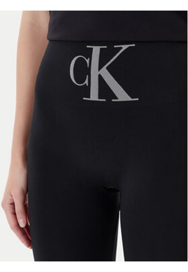 Calvin Klein Legginsy 701233380 Czarny Slim Fit. Kolor: czarny. Materiał: syntetyk