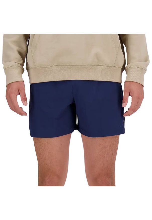 Spodenki męskie New Balance MS41286NNY - granatowe. Kolor: niebieski. Materiał: poliester, materiał, tkanina. Sport: fitness