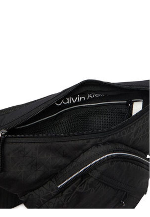 Calvin Klein Saszetka Utility Emblem Aop Crossbody LV04D3386G Czarny. Kolor: czarny. Materiał: materiał